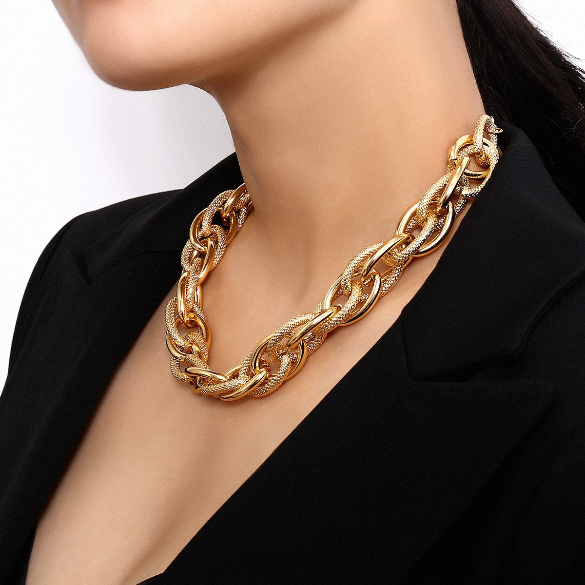 A minimalist handmade chain with a metallic textured mirror mixed necklace