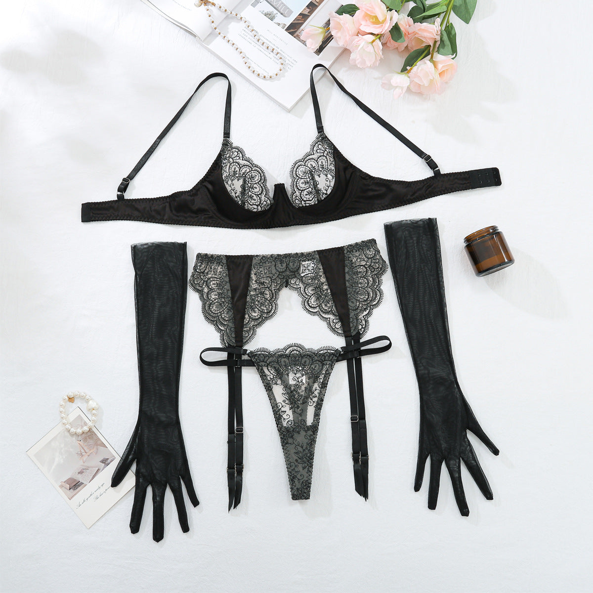 Fashionable new sexy embroidery lace fun backless lingerie set four piece set